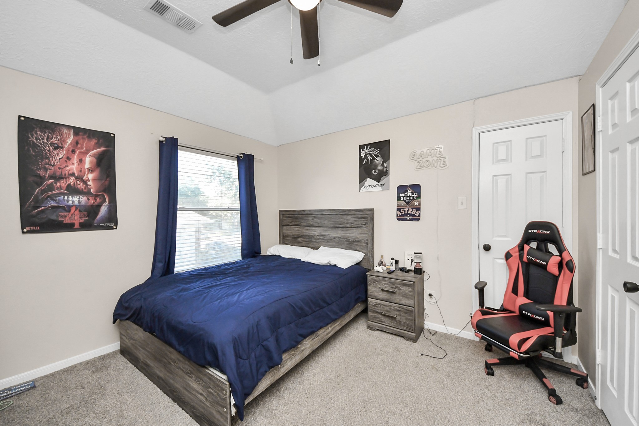 10514 Ravens Way Baytown, TX 77523 - Photo 24 of 50 Well-sized bedroom suitable for family, guests, or a home office.