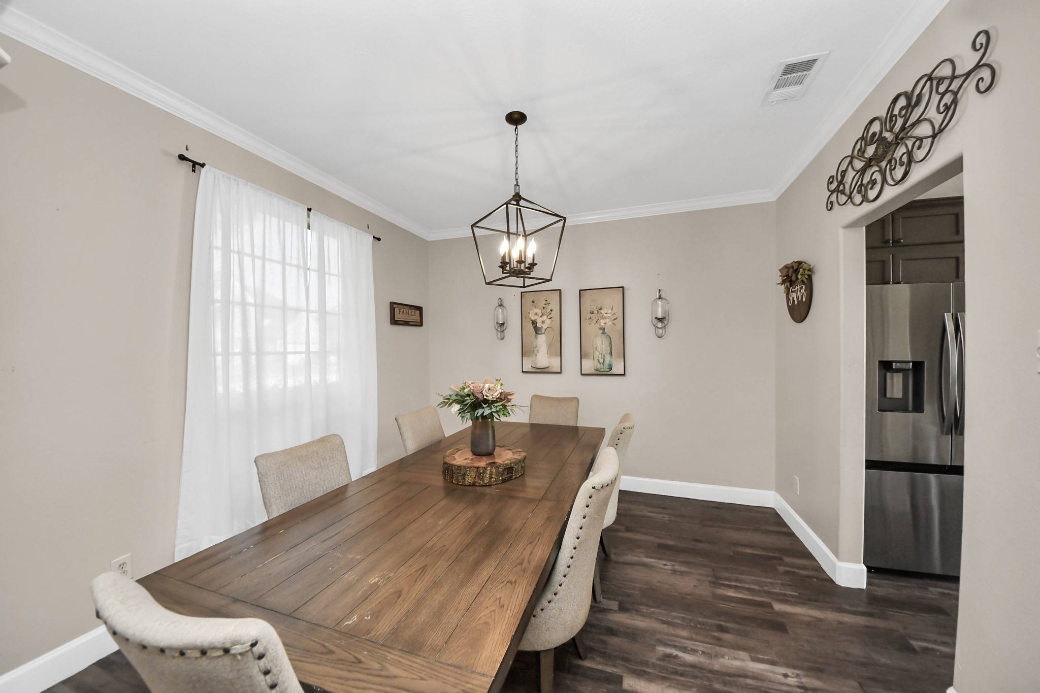10514 Ravens Way Baytown, TX 77523 - Photo 28 of 50 Open dining room offering plenty of room for entertaining and family dining.
