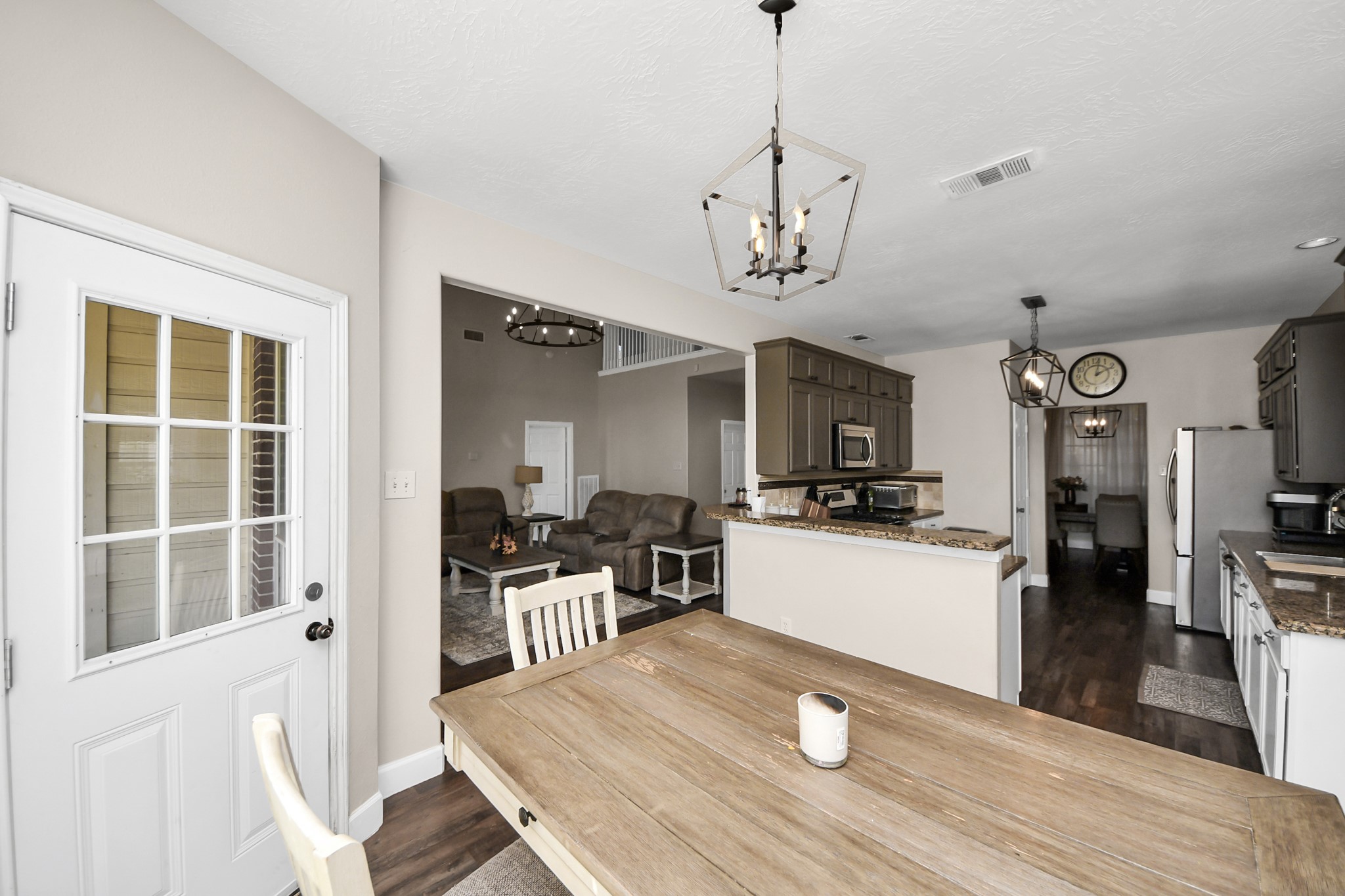 10514 Ravens Way Baytown, TX 77523 - Photo 32 of 50 Another view of the Breakfast nook looking into the kitchen and living space.