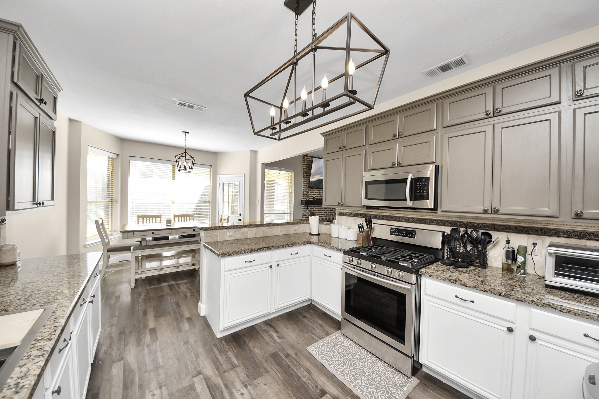 10514 Ravens Way Baytown, TX 77523 - Photo 38 of 50 View of the kitchen from the formal dining looking into the breakfast nook.