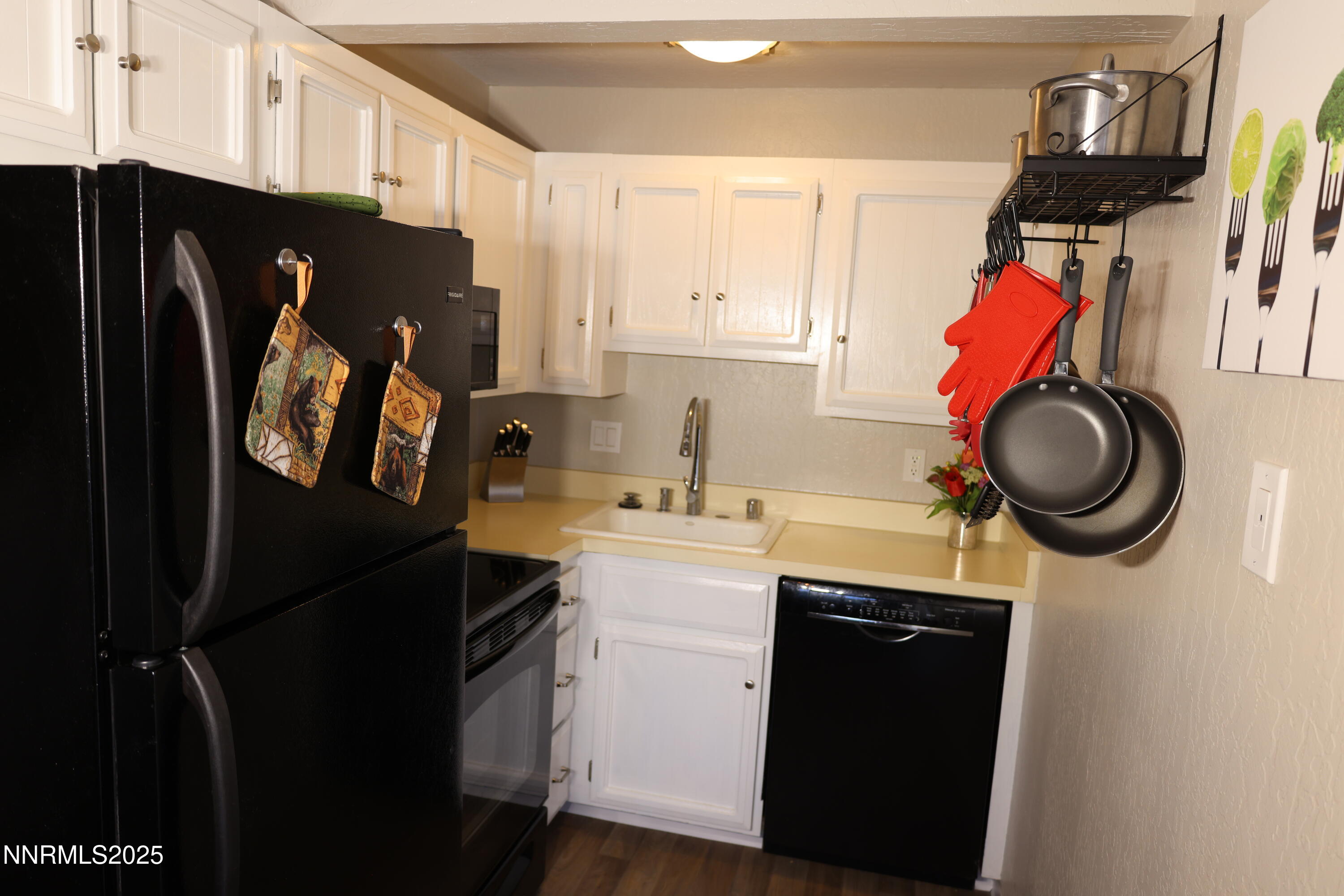 313 Tramway Drive, Unit 8 Stateline, NV 89449 - Photo 6 of 22 a kitchen with stainless steel appliances granite countertop a refrigerator a stove a sink and dishwasher