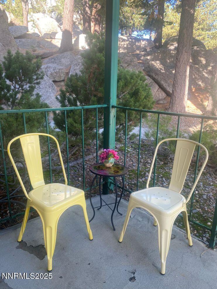313 Tramway Drive, Unit 8 Stateline, NV 89449 - Photo 8 of 22 a view of a chairs in the patio