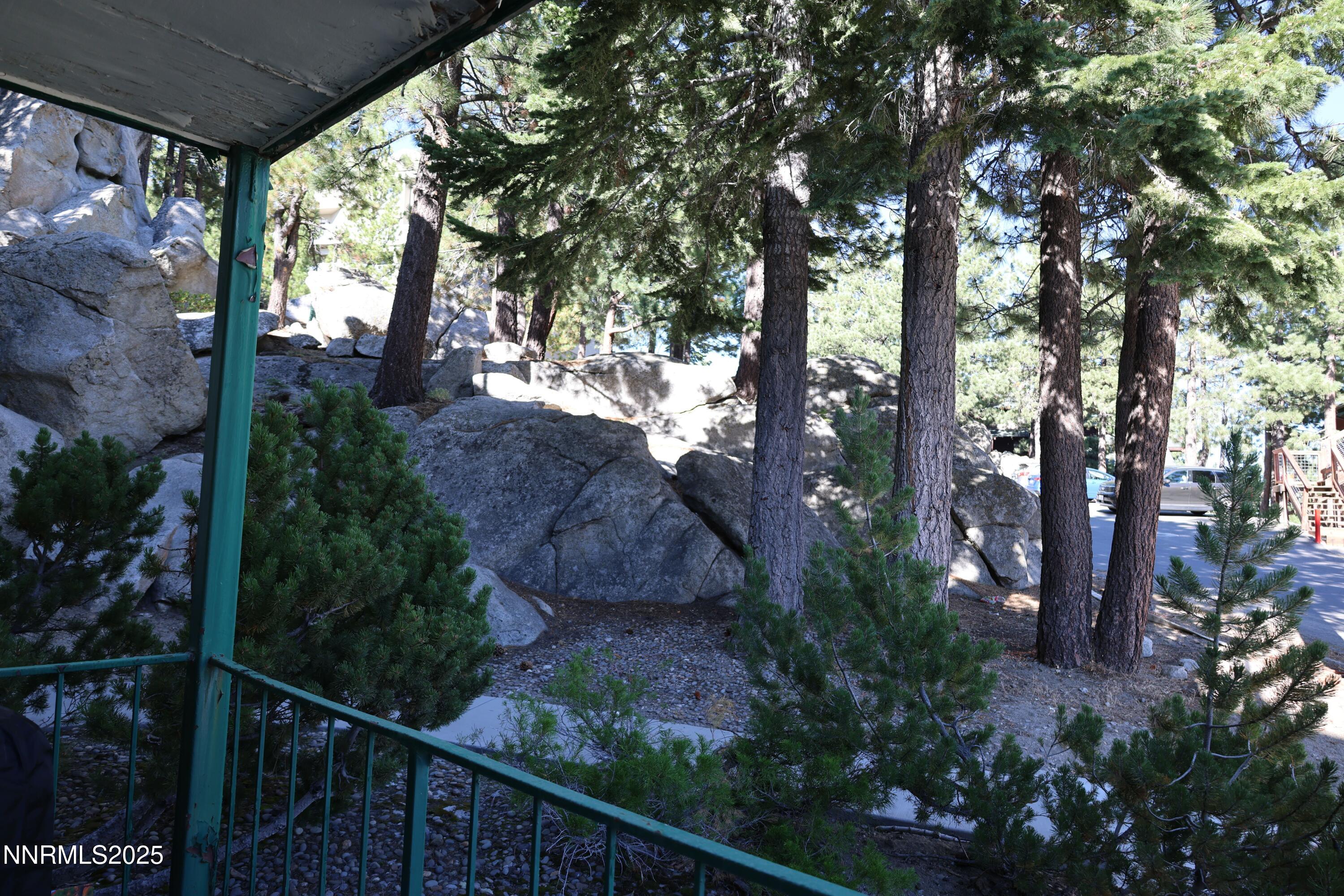 313 Tramway Drive, Unit 8 Stateline, NV 89449 - Photo 9 of 22 a view of a house with a tree in the background