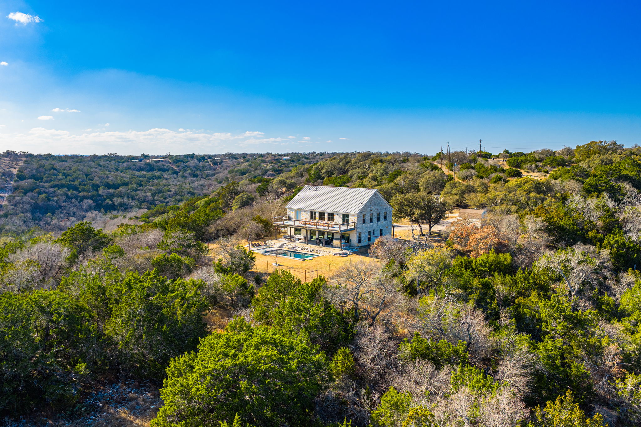 117 Point Road Fredericksburg, TX 78624 - Photo 1 of 40 View of subject property with a forest