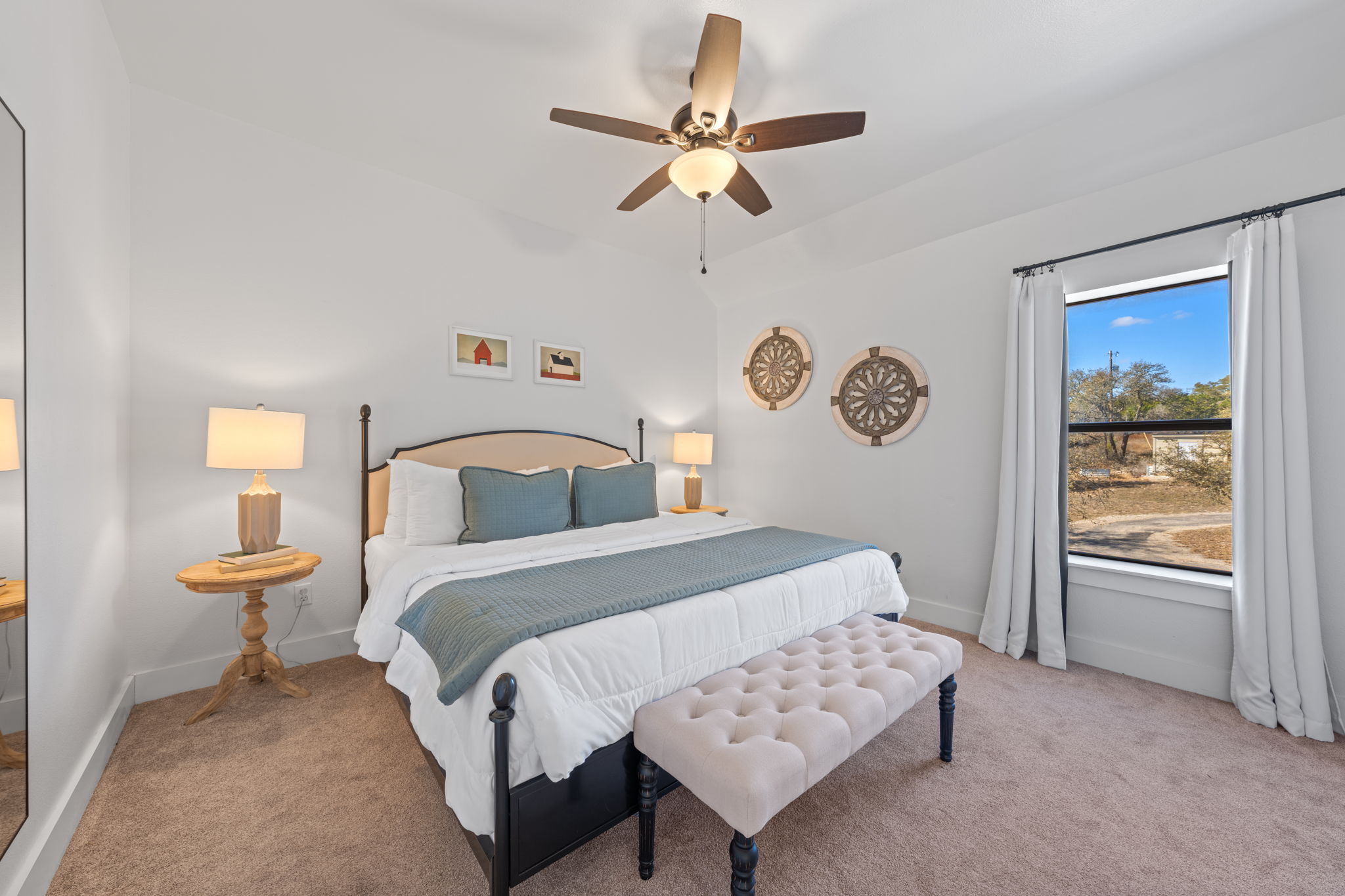 117 Point Road Fredericksburg, TX 78624 - Photo 22 of 40 Carpeted bedroom featuring ceiling fan and baseboards