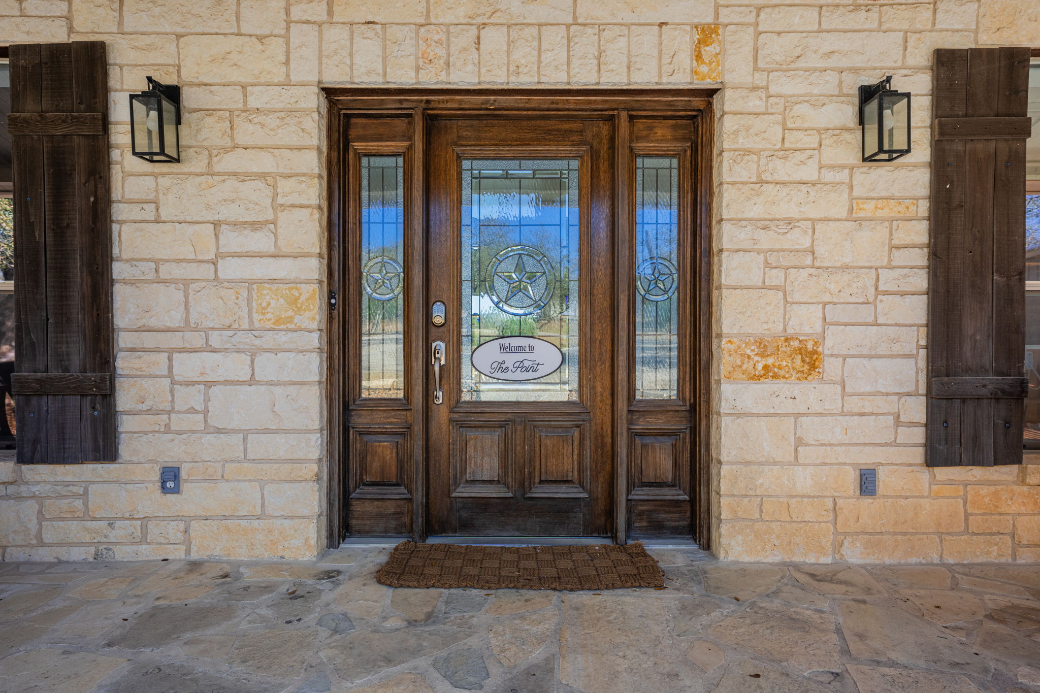 117 Point Road Fredericksburg, TX 78624 - Photo 5 of 40 Property entrance with stone siding