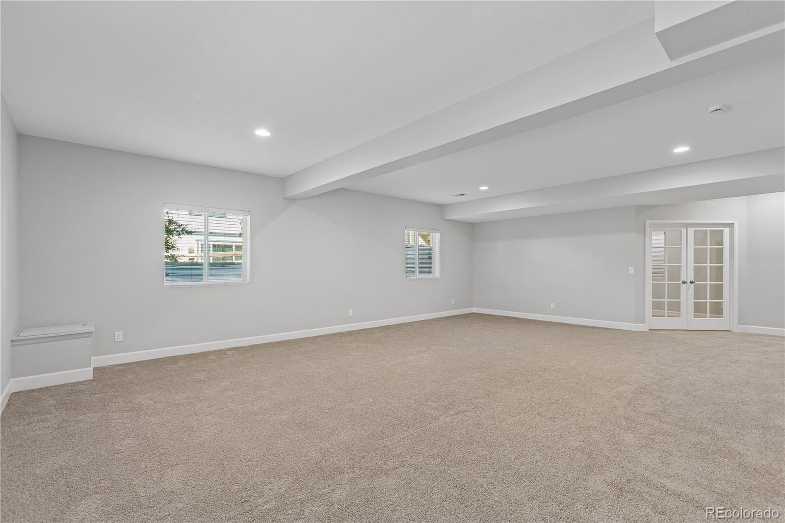 5031 South Rome Street Aurora, CO 80015 - Photo 35 of 39 a view of an empty room with a window