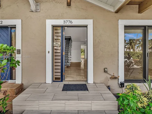 a view of a entryway door front of house