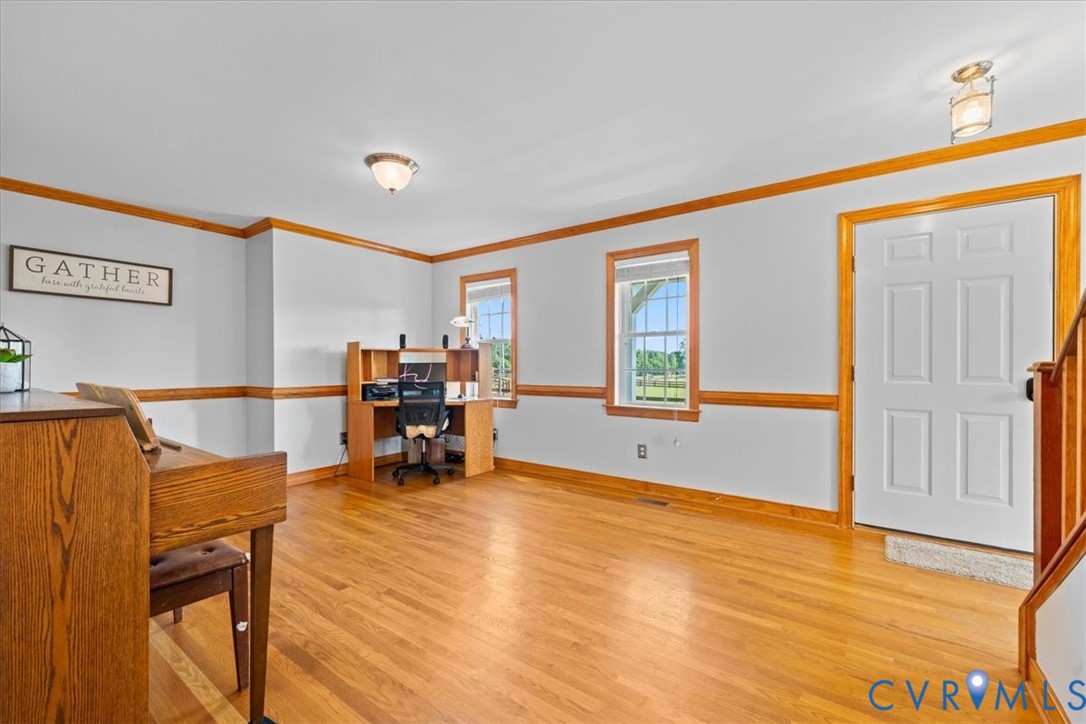 3137 Trenholm Road Powhatan, VA 23139 - Photo 24 of 72 a room with furniture and a wooden floor