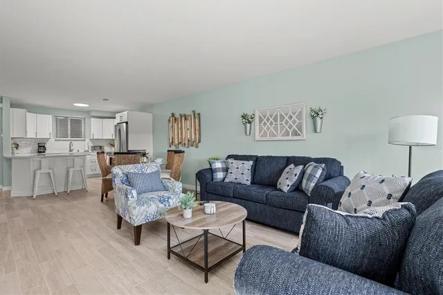 a living room with furniture and a table