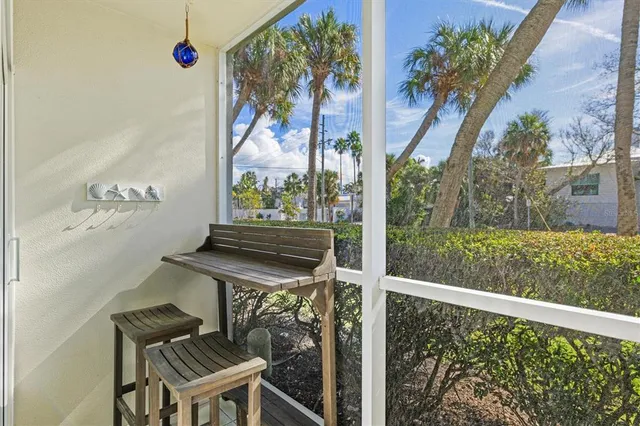 a view of a car park in front of house