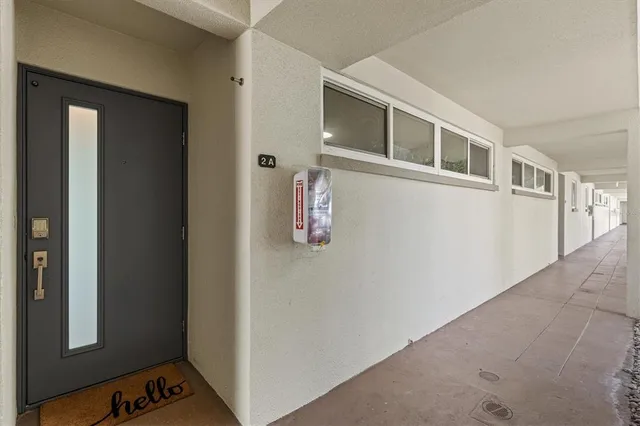 an aerial view of a house with a yard and garden