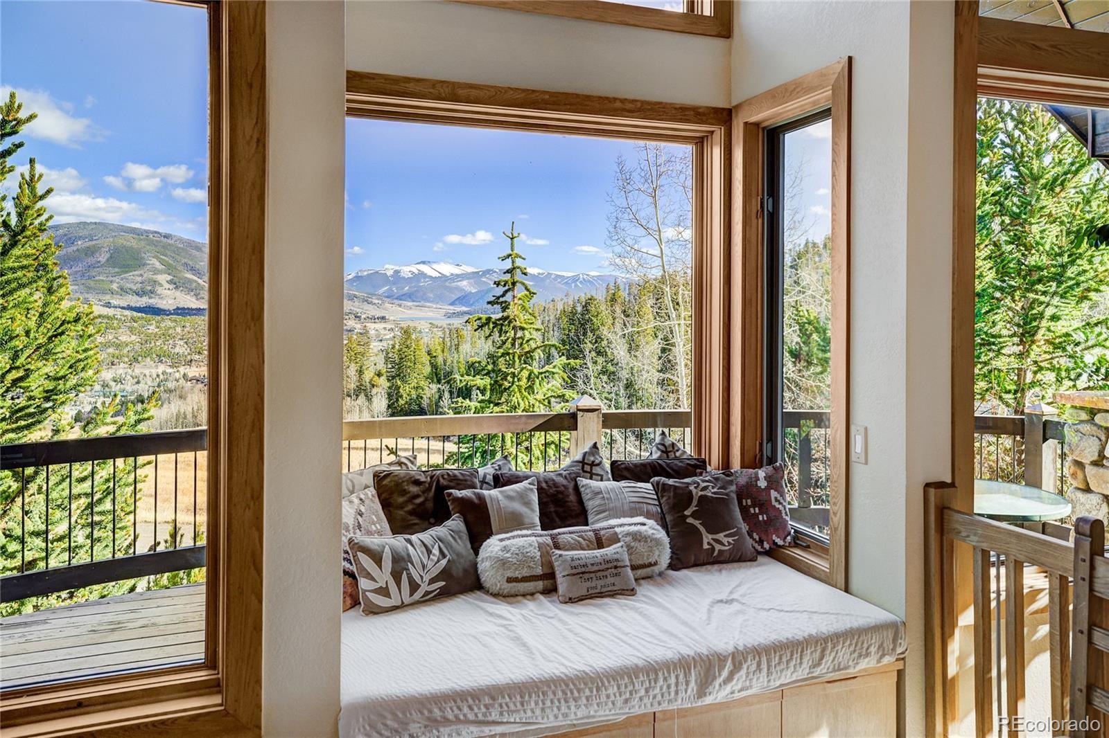 348 Jade Road Silverthorne, CO 80498 - Photo 11 of 48 a outdoor living room with furniture and a window