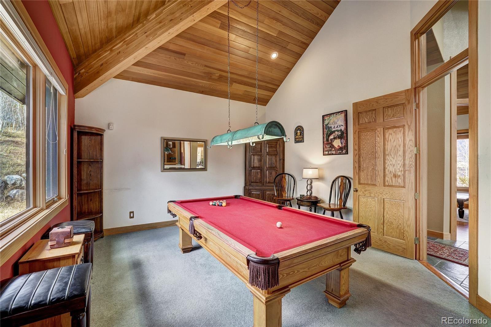 348 Jade Road Silverthorne, CO 80498 - Photo 16 of 48 a room with pool table and windows