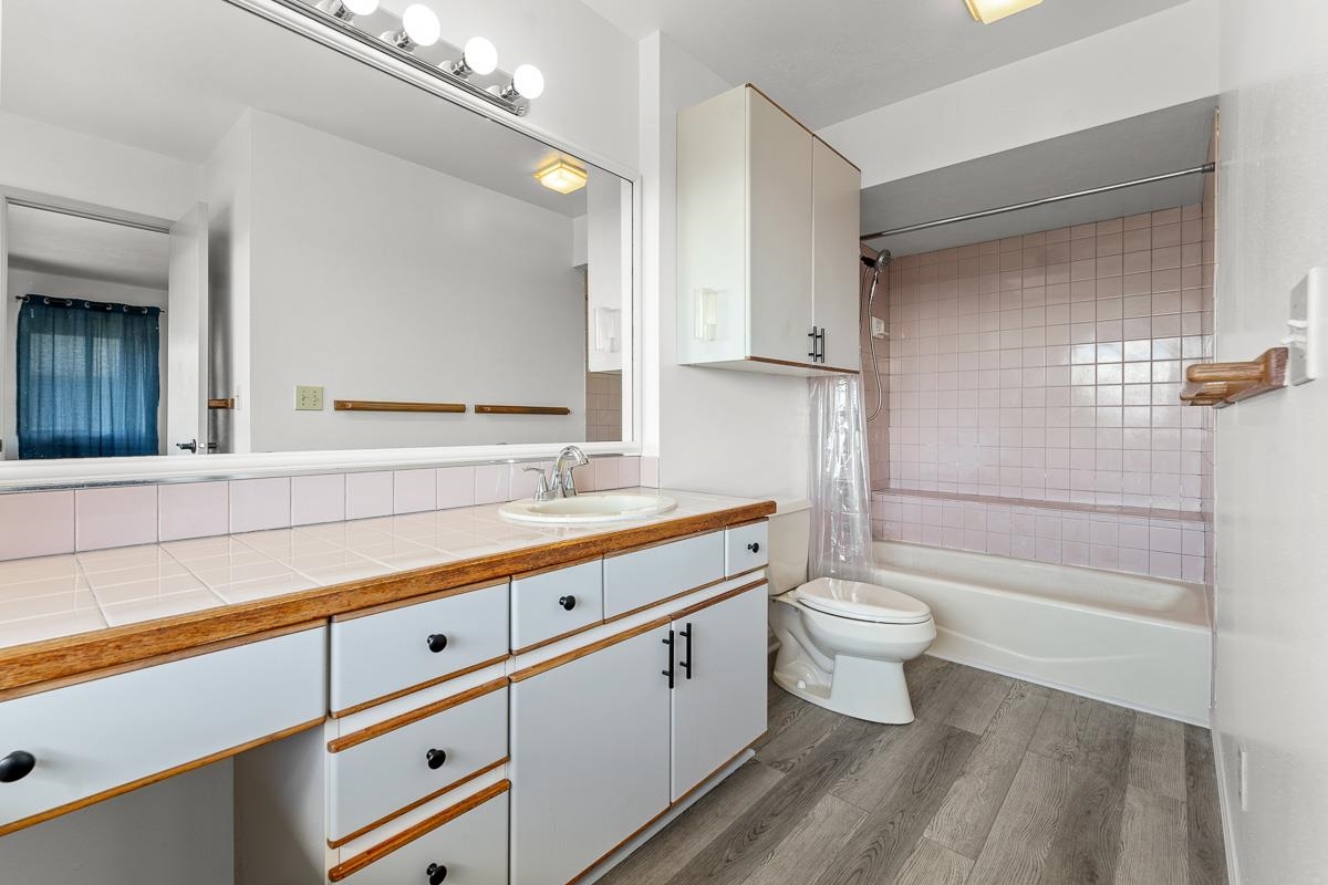 700 South Alu Road Wailuku, HI 96793 - Photo 25 of 42 a bathroom with a double vanity sink toilet and shower