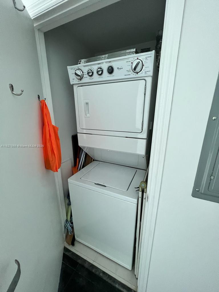 60 Southwest 13th Street, Unit 3407 Miami, FL 33130 - Photo 22 of 24 a utility room with dryer and washer
