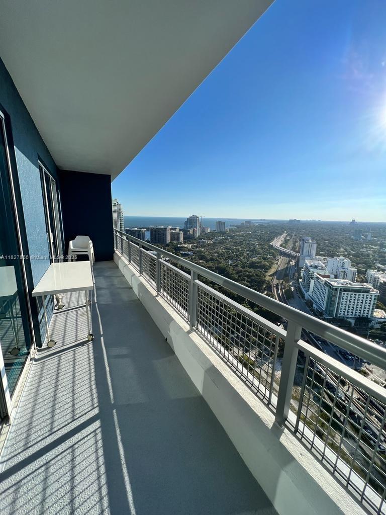 60 Southwest 13th Street, Unit 3407 Miami, FL 33130 - Photo 24 of 24 a view of balcony with furniture