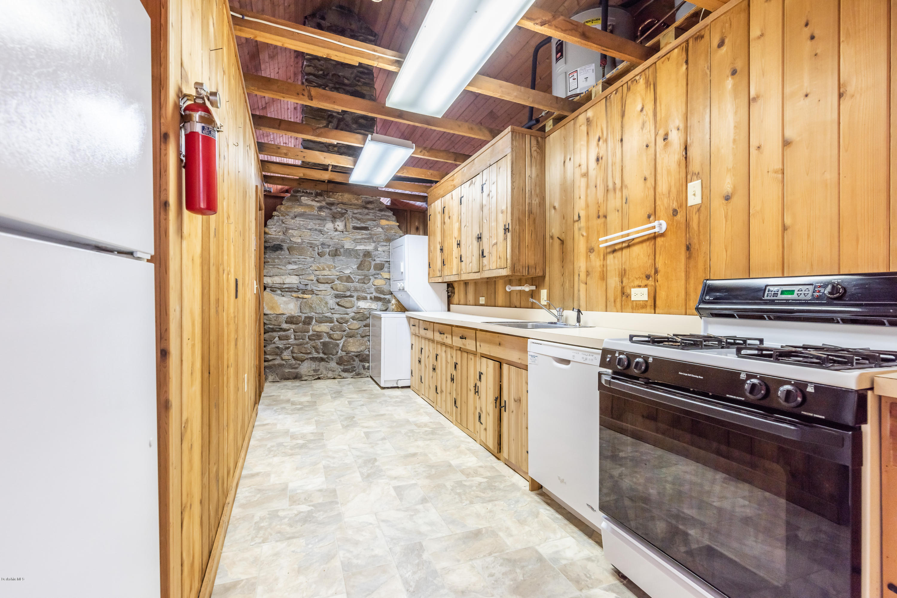 10 Housatonnuck Road Stockbridge, MA 01262 - Photo 17 of 30 a kitchen with a stove and a sink