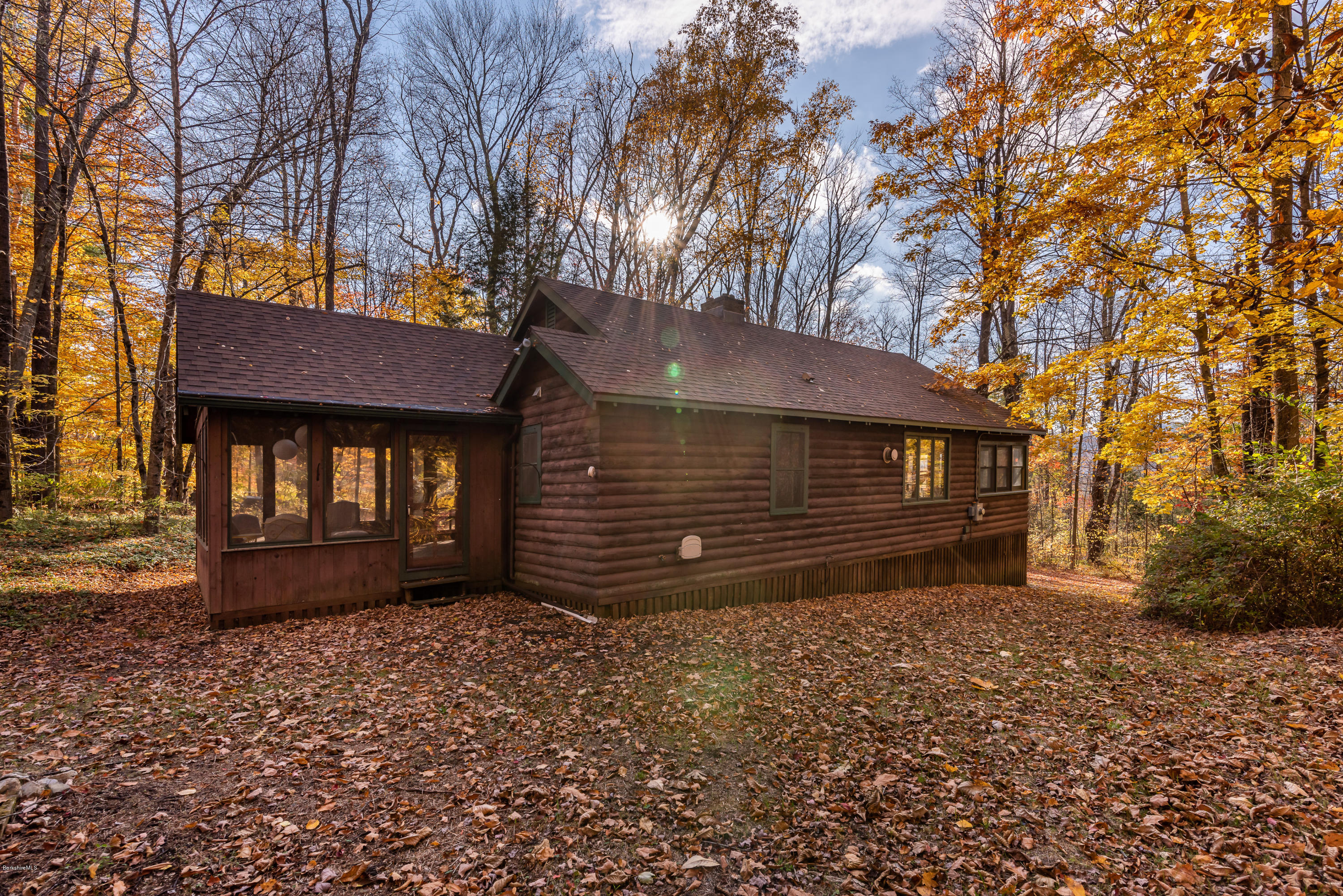 10 Housatonnuck Road Stockbridge, MA 01262 - Photo 24 of 30 a view of a house with a yard and wooden fence