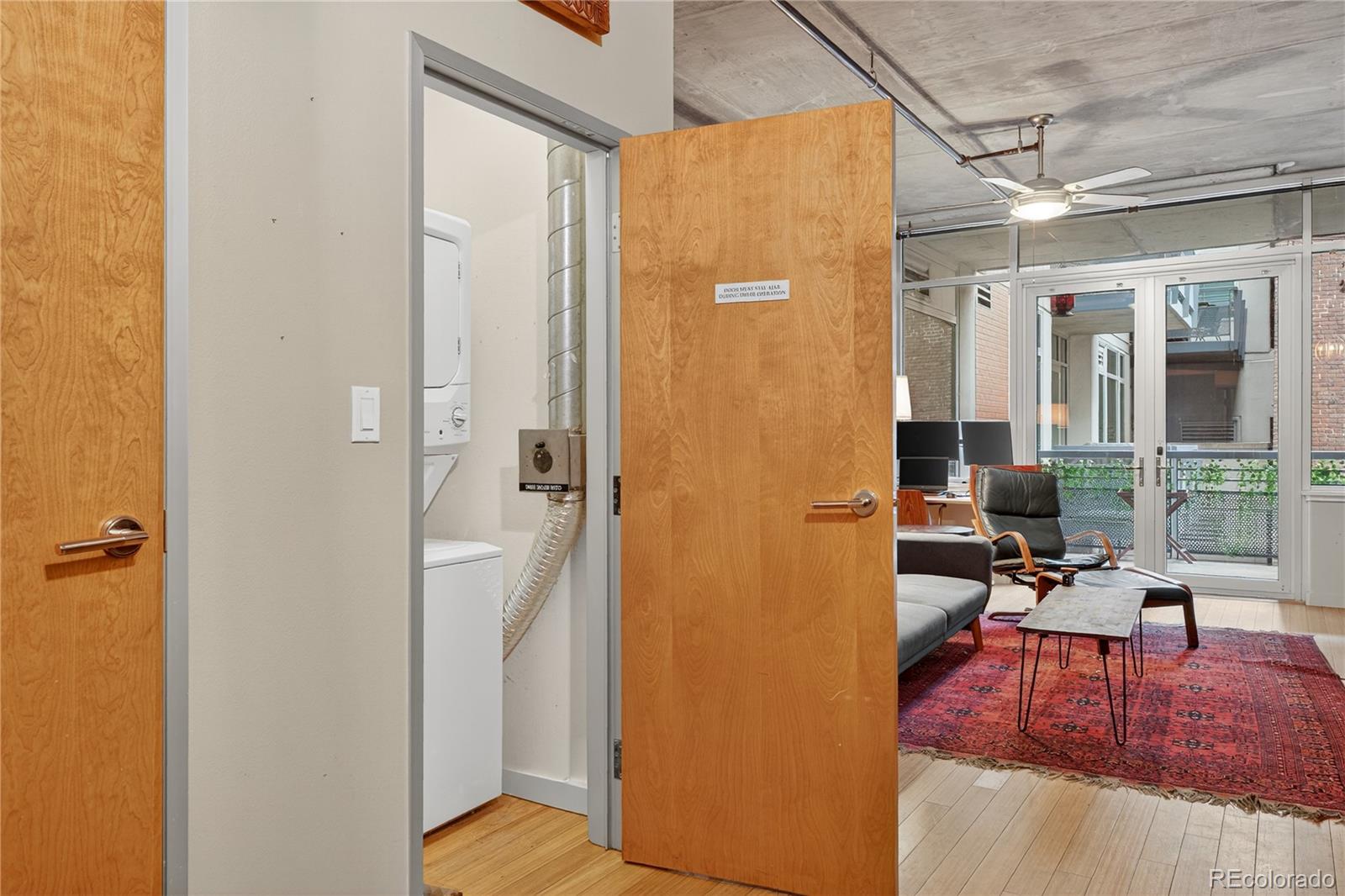 1401 Wewatta Street, Unit 305 Denver, CO 80202 - Photo 29 of 45 a view of a living room and bathroom