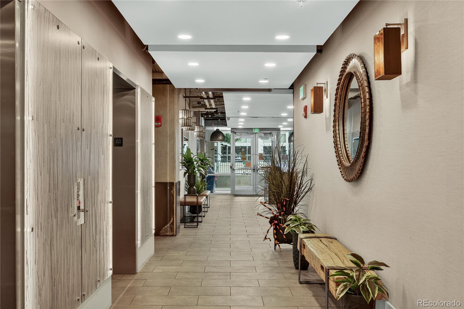1401 Wewatta Street, Unit 305 Denver, CO 80202 - Photo 31 of 45 a view of entryway with livingroom and furniture