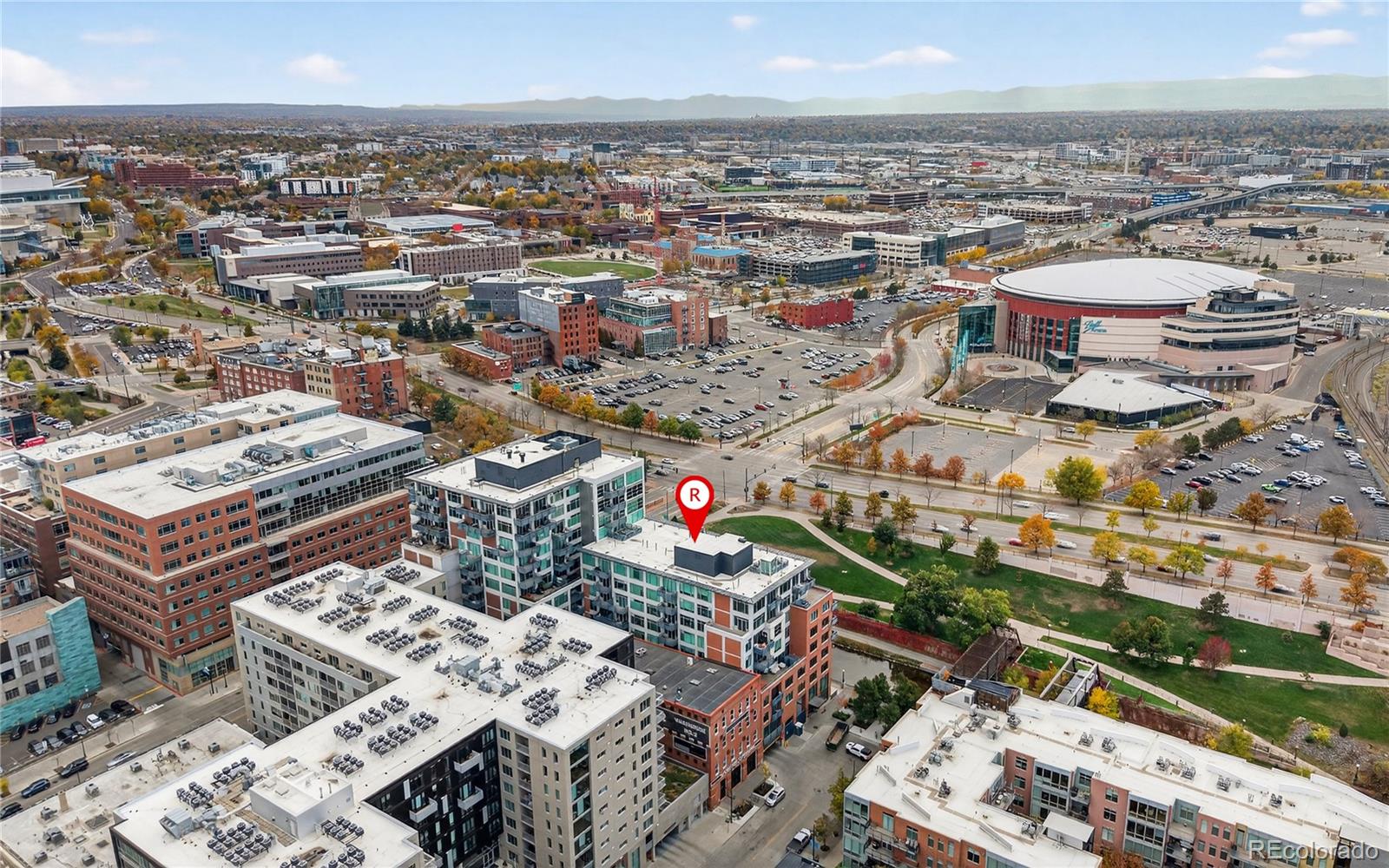 1401 Wewatta Street, Unit 305 Denver, CO 80202 - Photo 39 of 45 an aerial view of a city with parking
