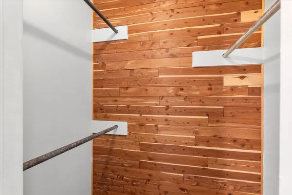 a bathroom with a shower and a sink