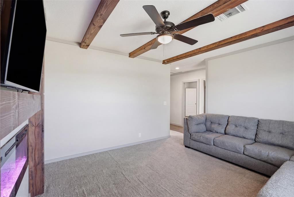 151 Private Road 3814 Springtown, TX 76082 - Photo 25 of 29 a living room with furniture and a ceiling fan