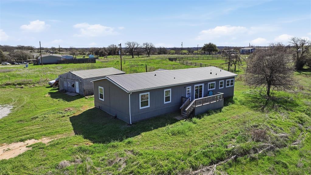 151 Private Road 3814 Springtown, TX 76082 - Photo 27 of 29 an aerial view of a house having yard and a big yard