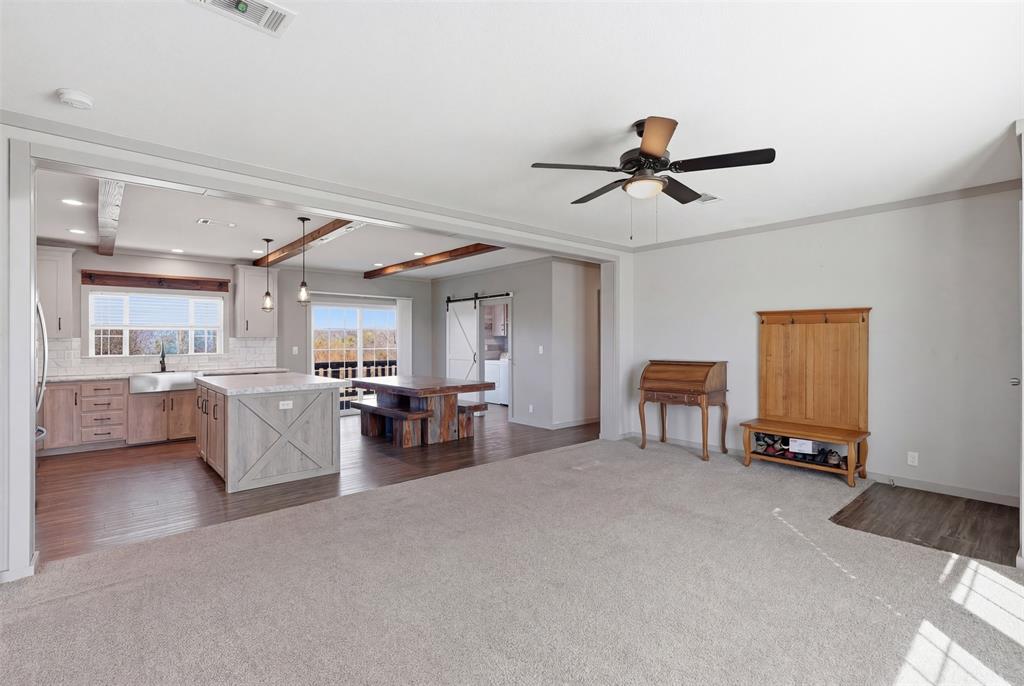 151 Private Road 3814 Springtown, TX 76082 - Photo 3 of 29 a living room with furniture and a gym machine