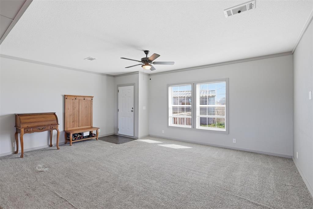 151 Private Road 3814 Springtown, TX 76082 - Photo 4 of 29 a view of an empty room with a window