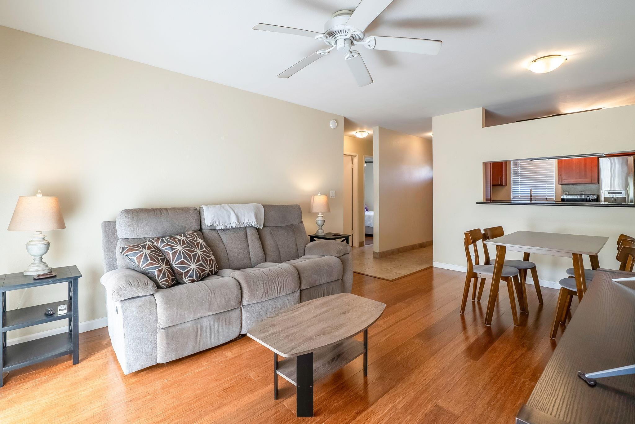 480 Kenolio Road, Unit 6204 Kihei, HI 96753 - Photo 12 of 44 a living room with furniture and wooden floor
