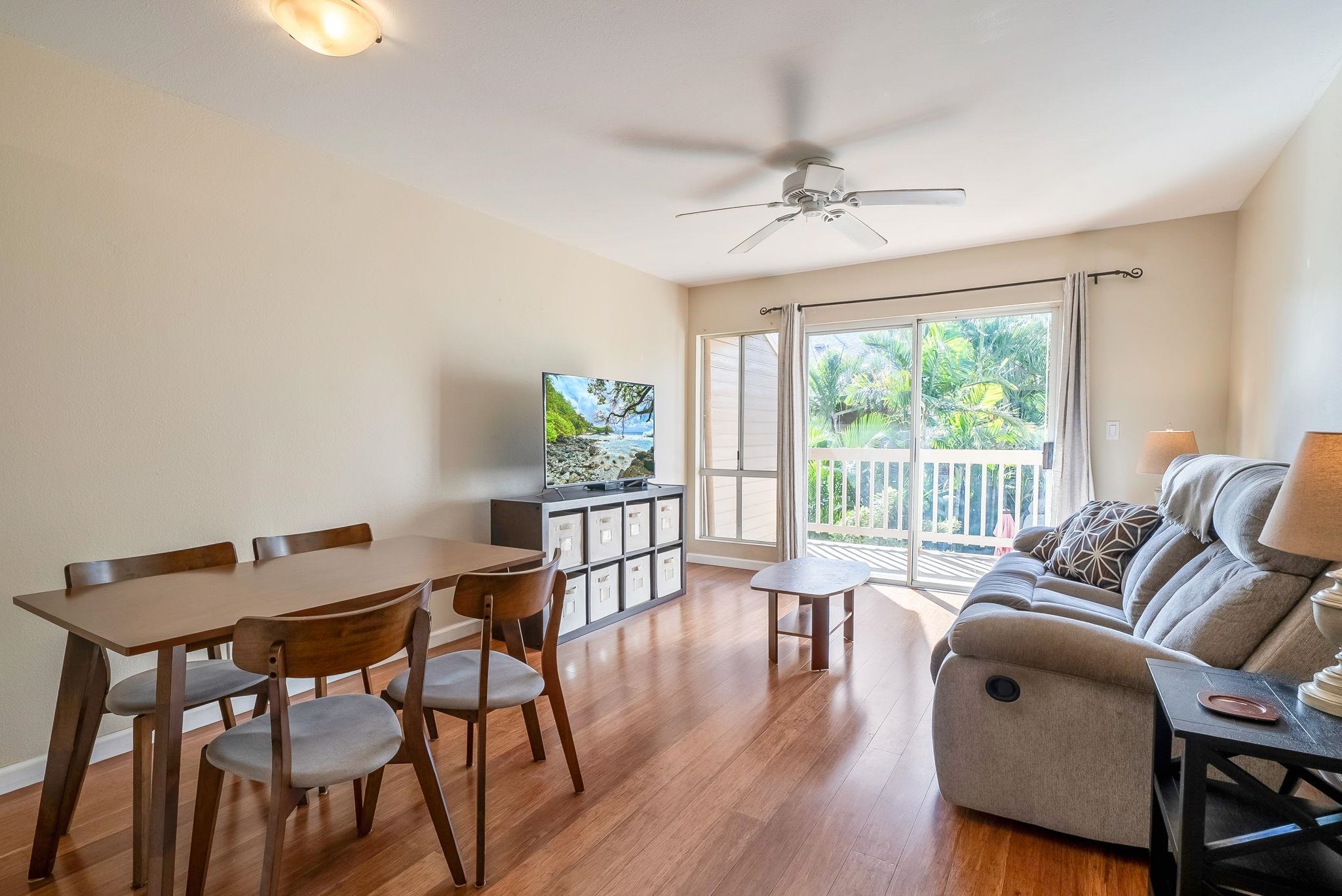 480 Kenolio Road, Unit 6204 Kihei, HI 96753 - Photo 14 of 44 a living room with furniture and a window