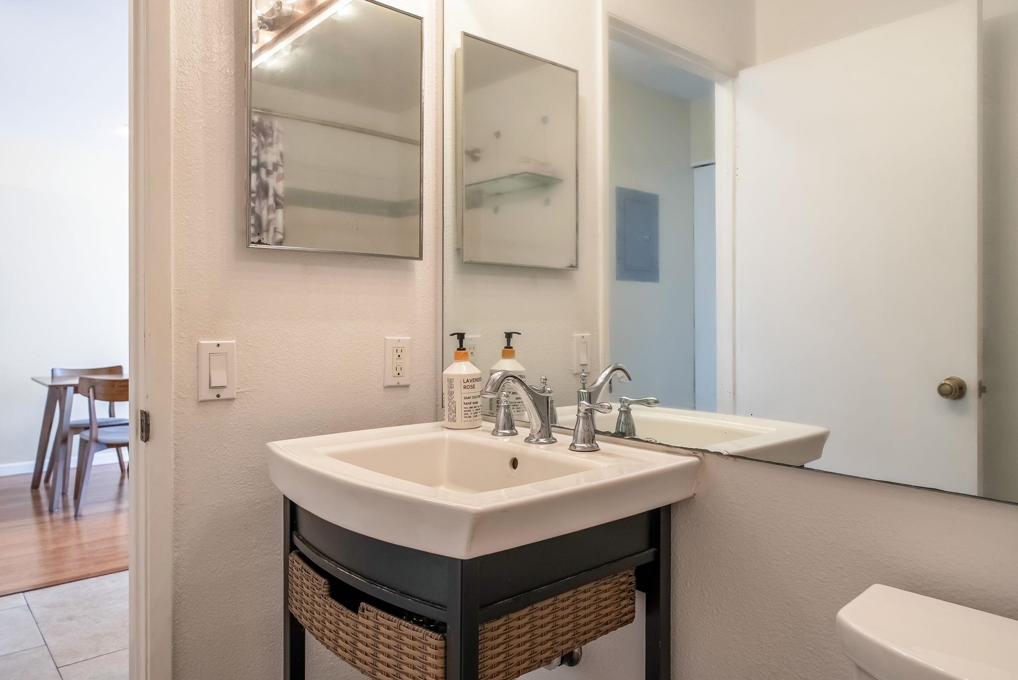 480 Kenolio Road, Unit 6204 Kihei, HI 96753 - Photo 32 of 44 a sink and a mirror