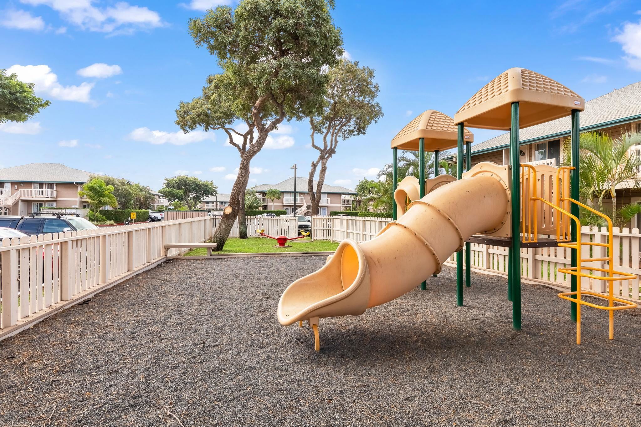 480 Kenolio Road, Unit 6204 Kihei, HI 96753 - Photo 41 of 44 a swimming pool with outdoor seating and yard