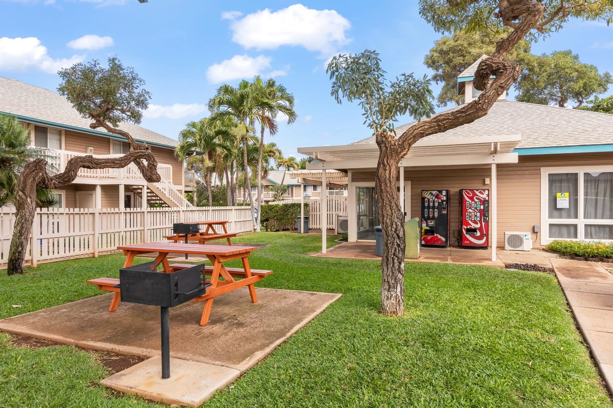 480 Kenolio Road, Unit 6204 Kihei, HI 96753 - Photo 42 of 44 a front view of a house with garden and trees