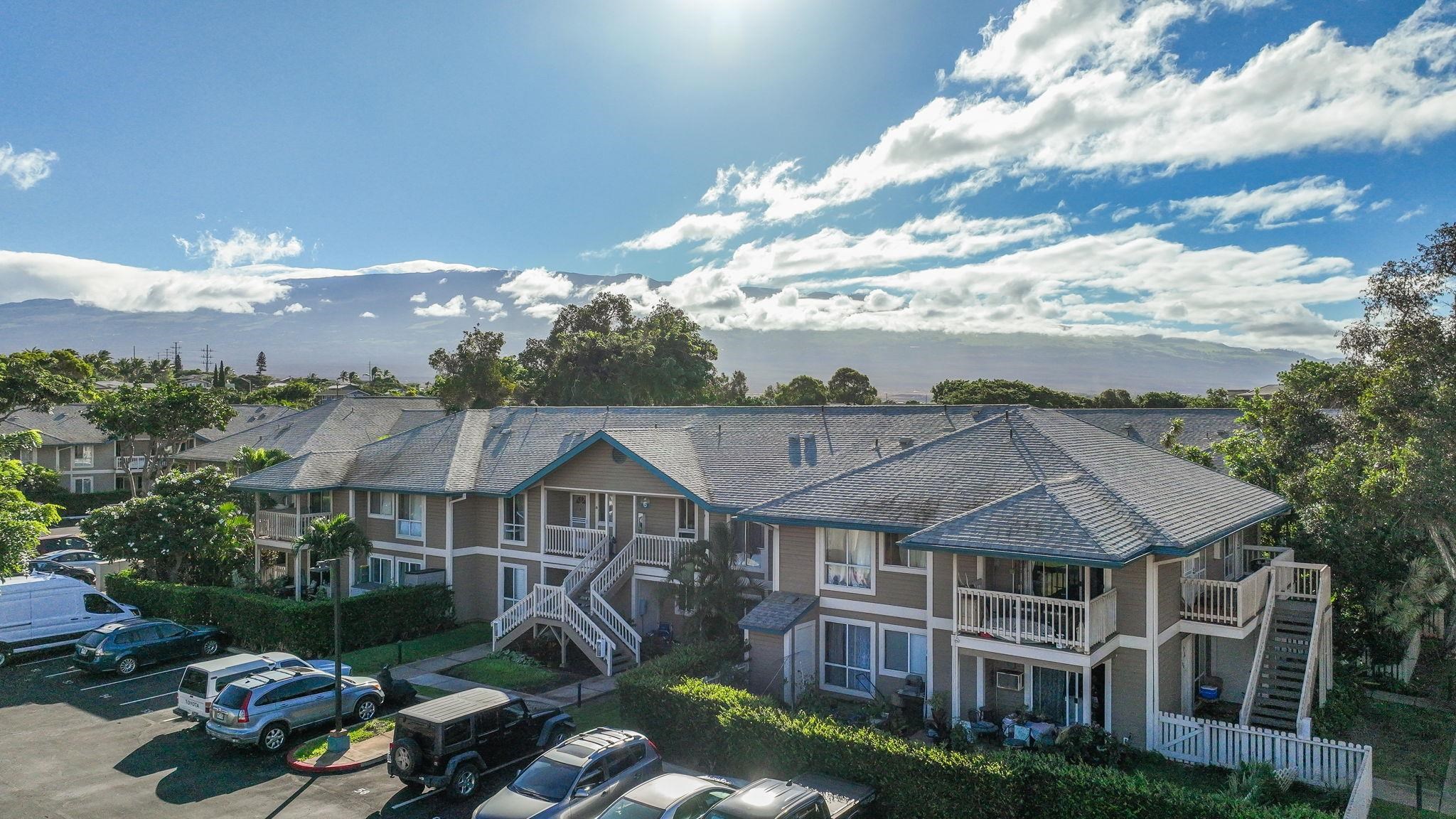 480 Kenolio Road, Unit 6204 Kihei, HI 96753 - Photo 9 of 44 a front view of a house with garden space and street view