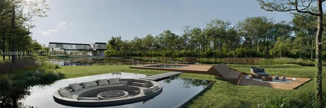 a view of a swimming pool with a patio and a yard