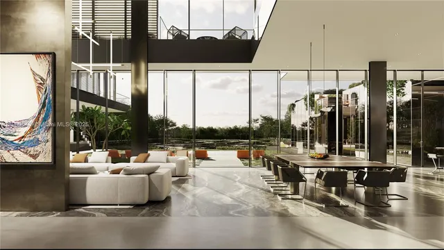 a living room with large windows and a table