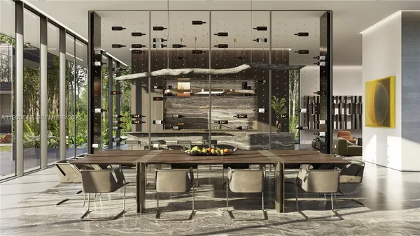 a kitchen with a table and chairs