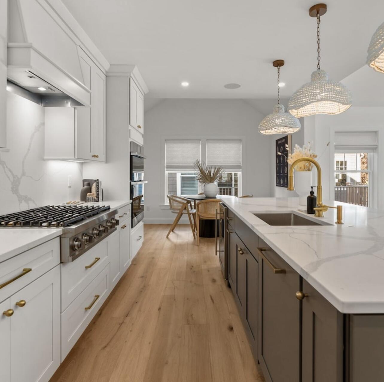 3 Azalea Lane Mashpee, MA 02649 - Photo 11 of 29 a large kitchen with stainless steel appliances granite countertop a lot of counter space and wooden floor