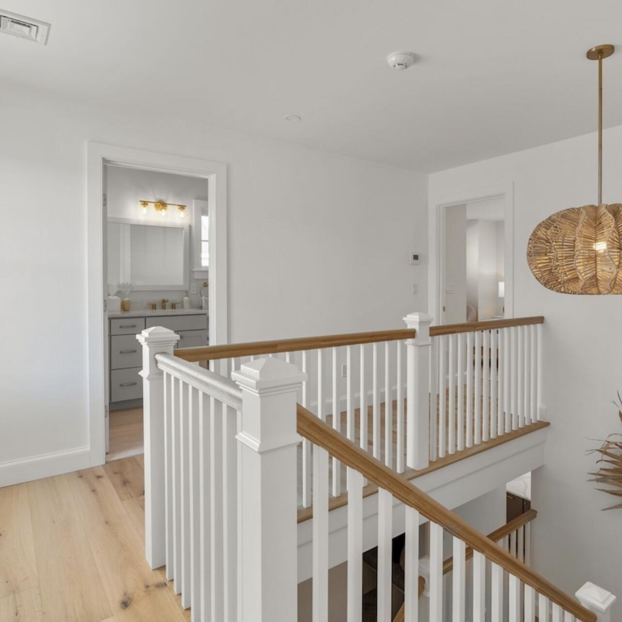 3 Azalea Lane Mashpee, MA 02649 - Photo 18 of 29 a view of staircase with railing and white walls