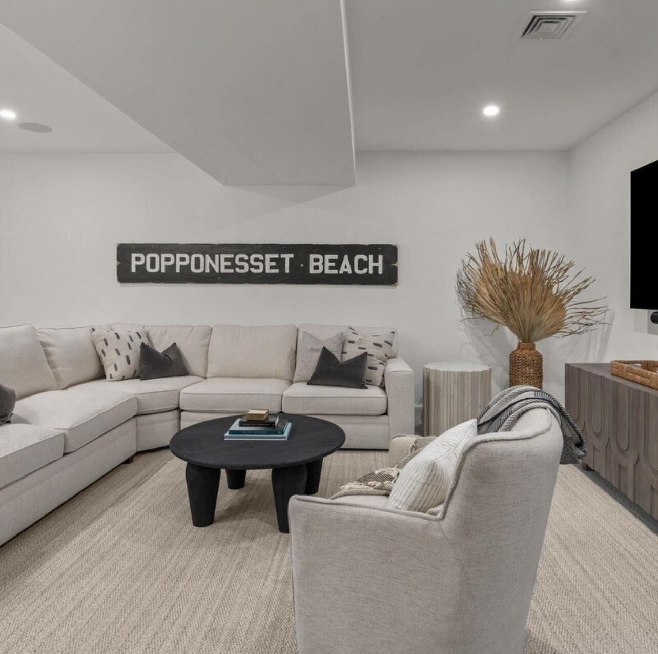 3 Azalea Lane Mashpee, MA 02649 - Photo 23 of 29 a living room with furniture and a flat screen tv