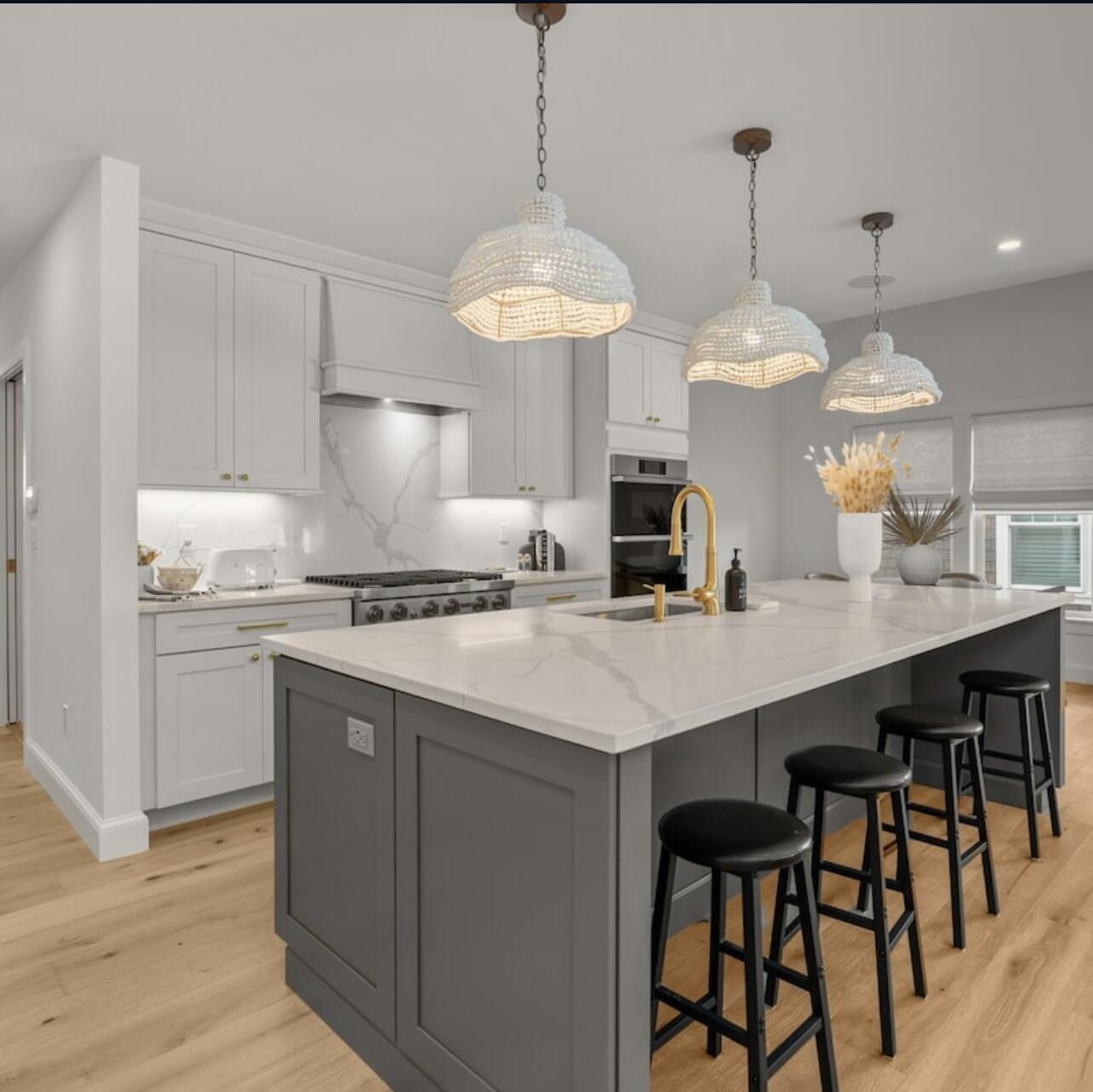 3 Azalea Lane Mashpee, MA 02649 - Photo 3 of 29 a kitchen with kitchen island granite countertop a sink a center island and cabinets