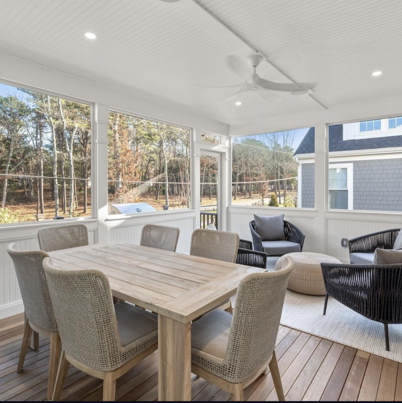3 Azalea Lane Mashpee, MA 02649 - Photo 5 of 29 a view of a dining room with furniture large windows and wooden floor