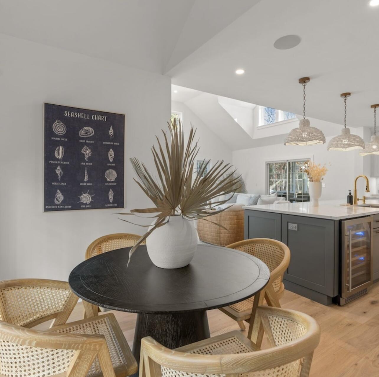 3 Azalea Lane Mashpee, MA 02649 - Photo 9 of 29 a view of a dining room with furniture and a potted plant