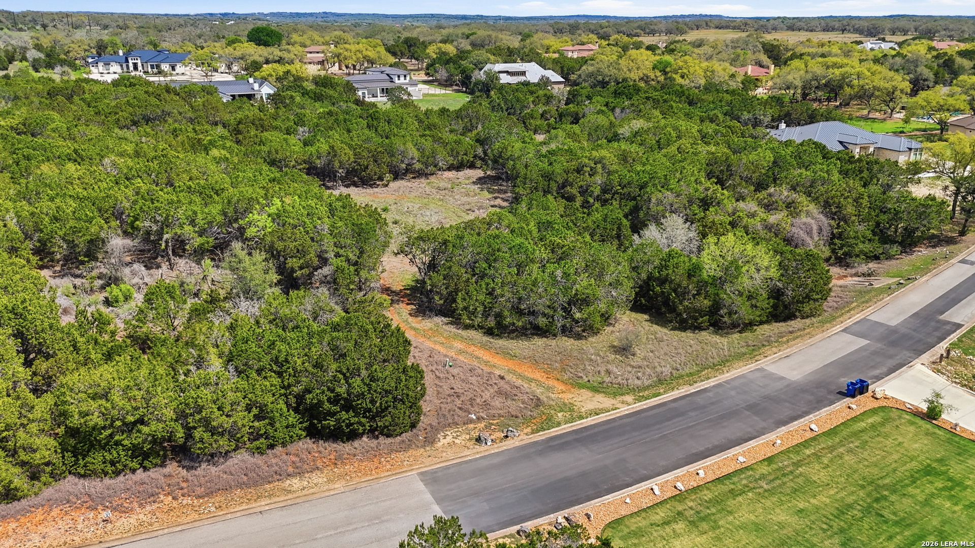 27230 Eichenbaum Road New Braunfels, TX 78132 - Photo 11 of 38 a view of a yard with wooden fence