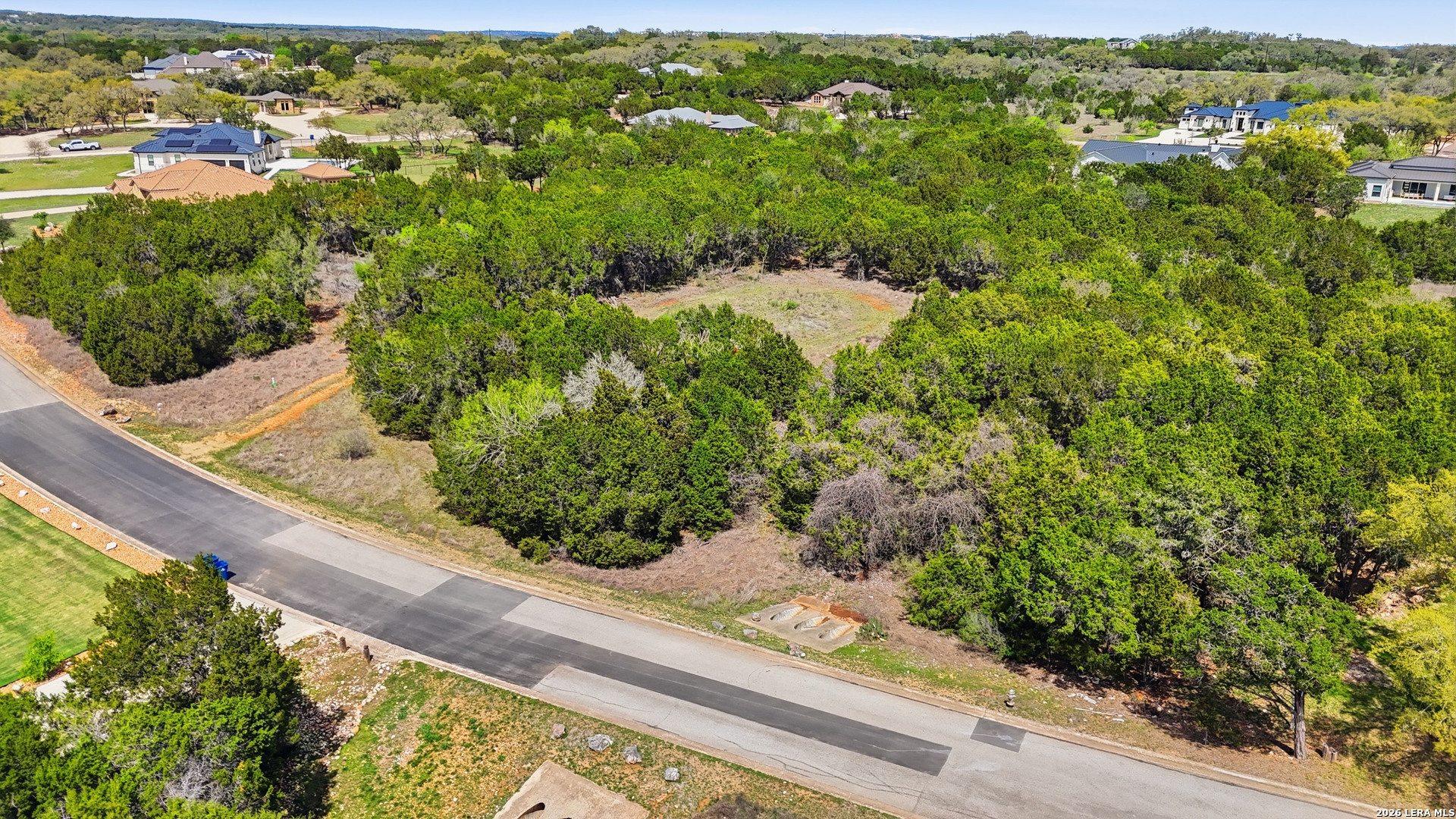 27230 Eichenbaum Road New Braunfels, TX 78132 - Photo 13 of 38 an aerial view of residential houses with outdoor space and trees