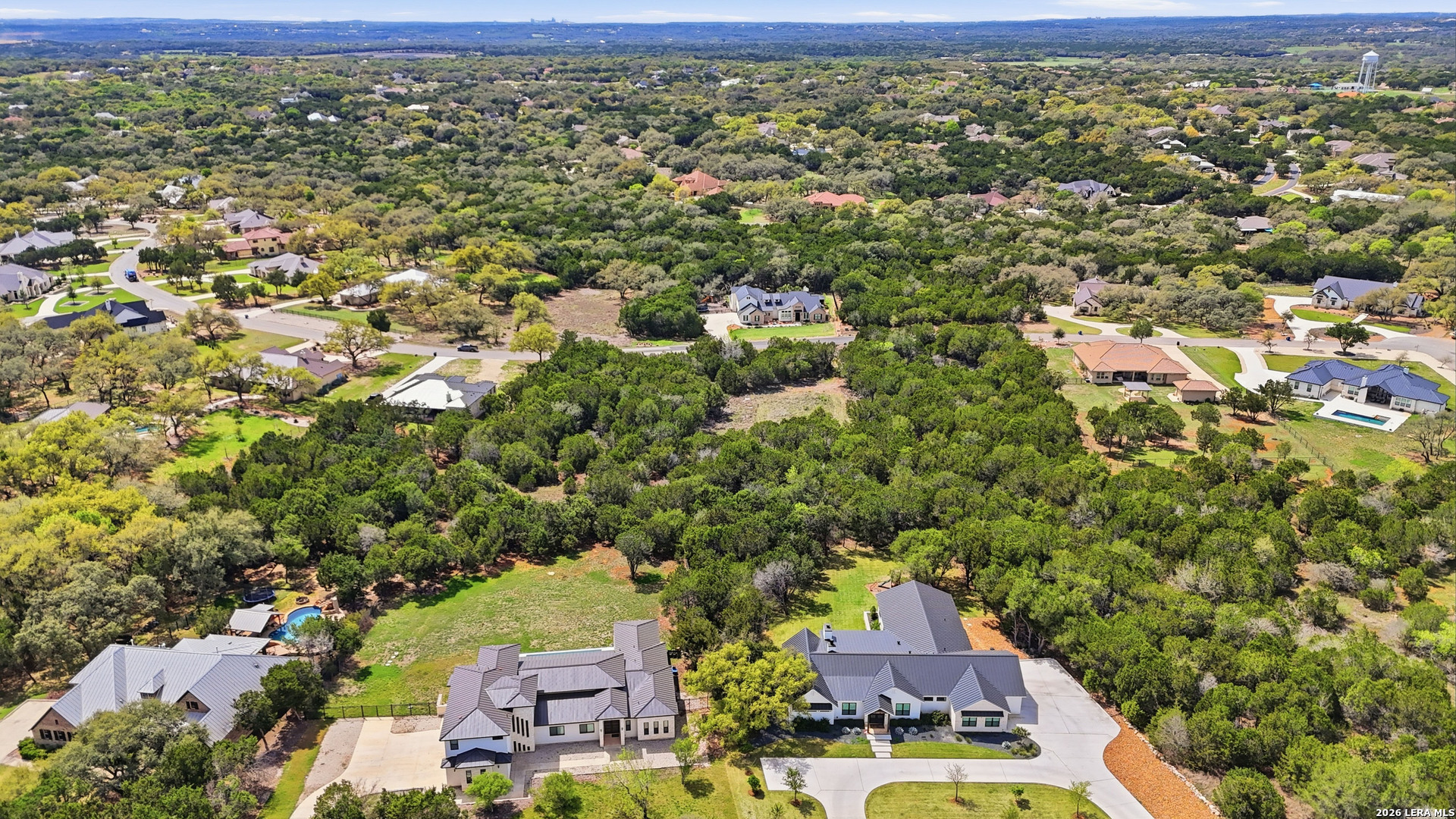 27230 Eichenbaum Road New Braunfels, TX 78132 - Photo 24 of 38 an aerial view of residential houses with outdoor space