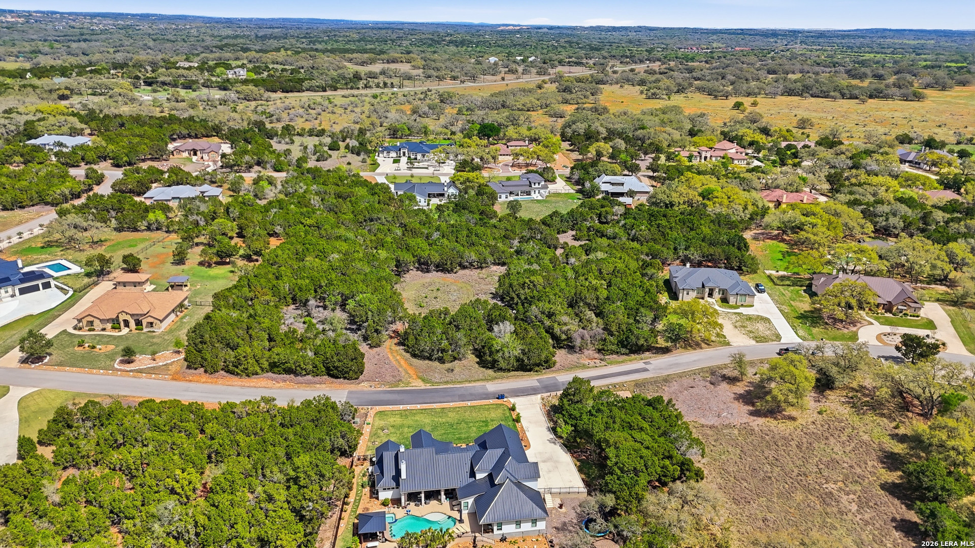 27230 Eichenbaum Road New Braunfels, TX 78132 - Photo 28 of 38 an aerial view of residential houses with outdoor space
